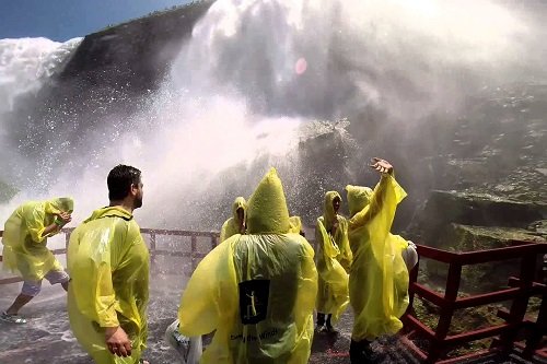 Getting wet doing the Cave of the Winds on a Niagara Falls Private Tour