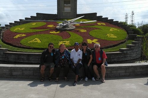 Picture of a group at the floral clock during our Niagara Falls Canadian American tour