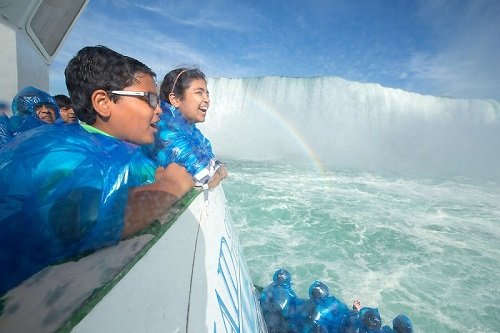 A family on The Maid of the Mist aboard one of our Niagara Falls Tours Canada