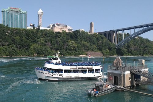 A tour group aboard the Maid of the Mist in Niagara Falls