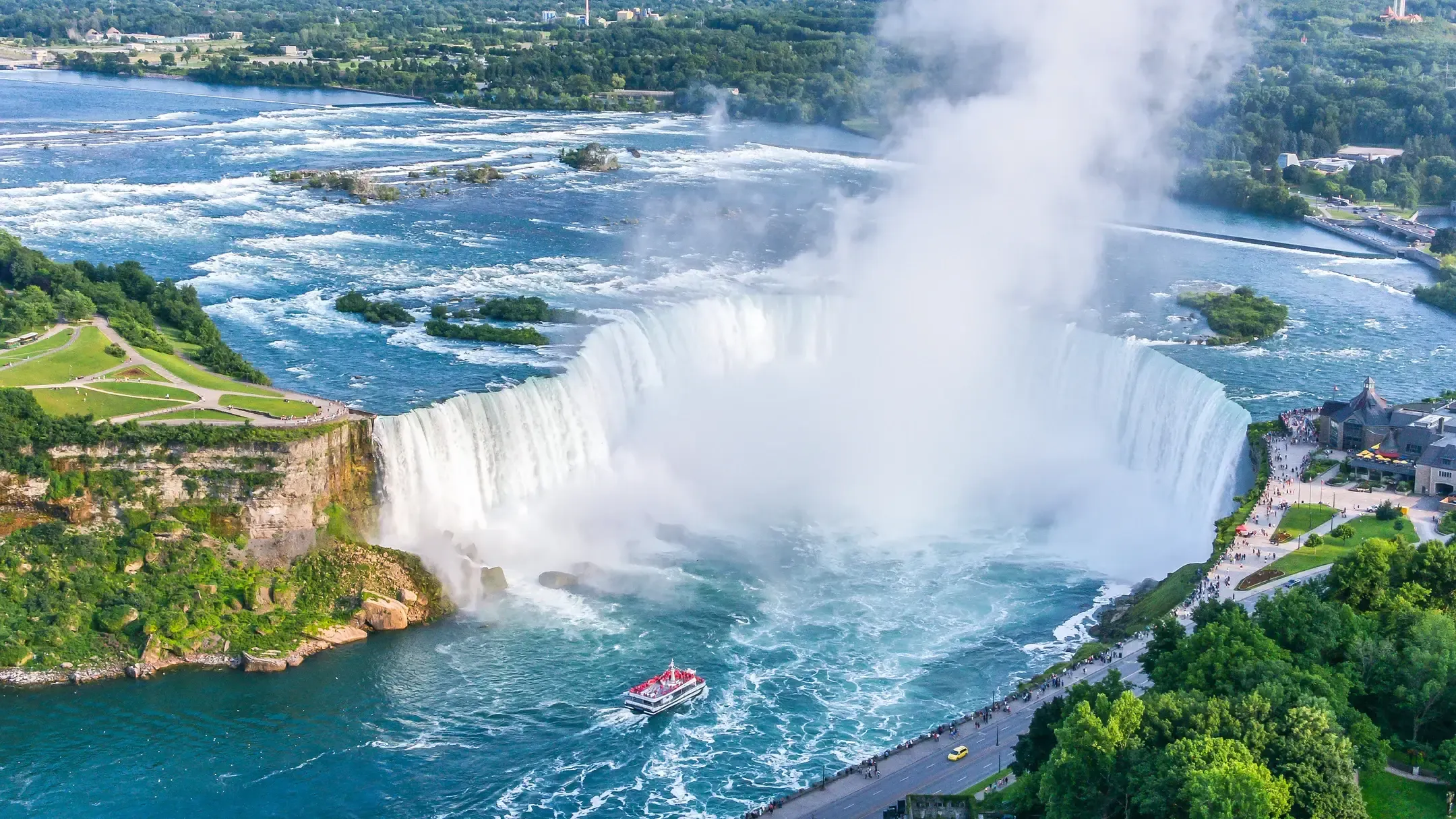 Aerial view of Horseshoe Falls with the Maid of the Mist boat below